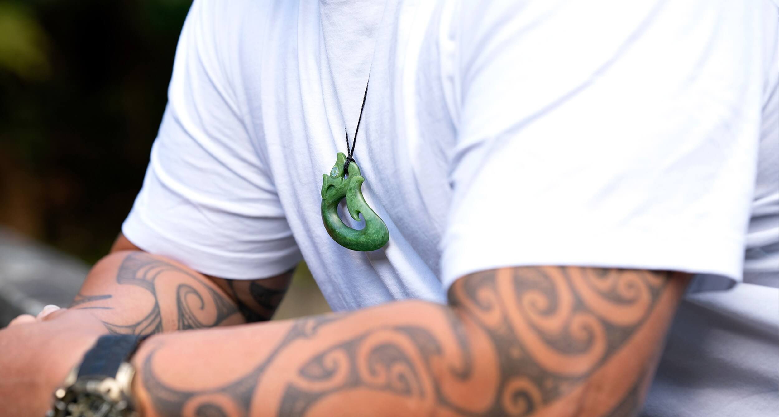 Image of man wearing jade piece